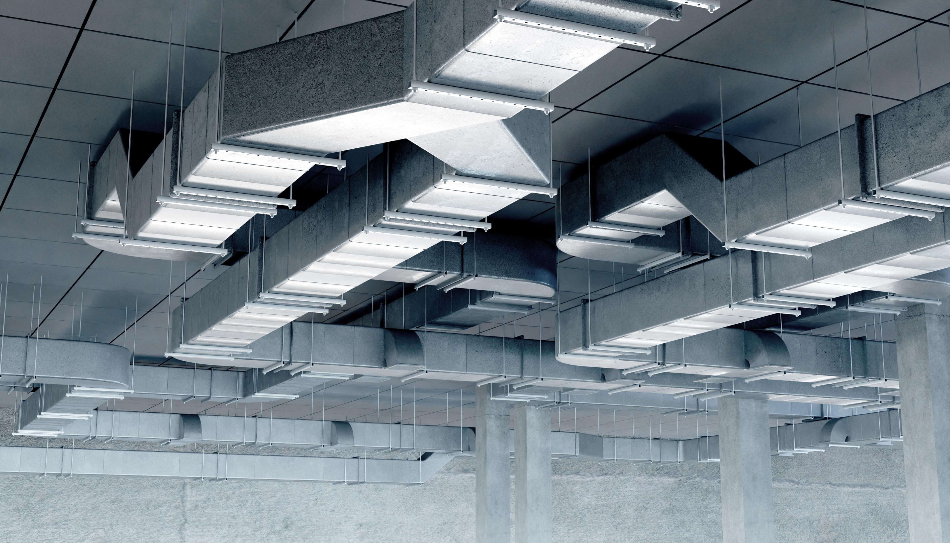 Ceiling with commercial HVAC ductwork and lighting