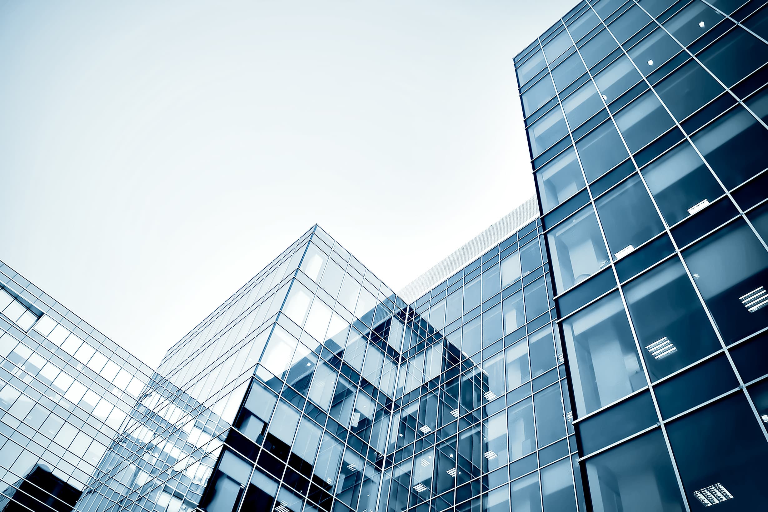Modern glass office buildings viewed from below